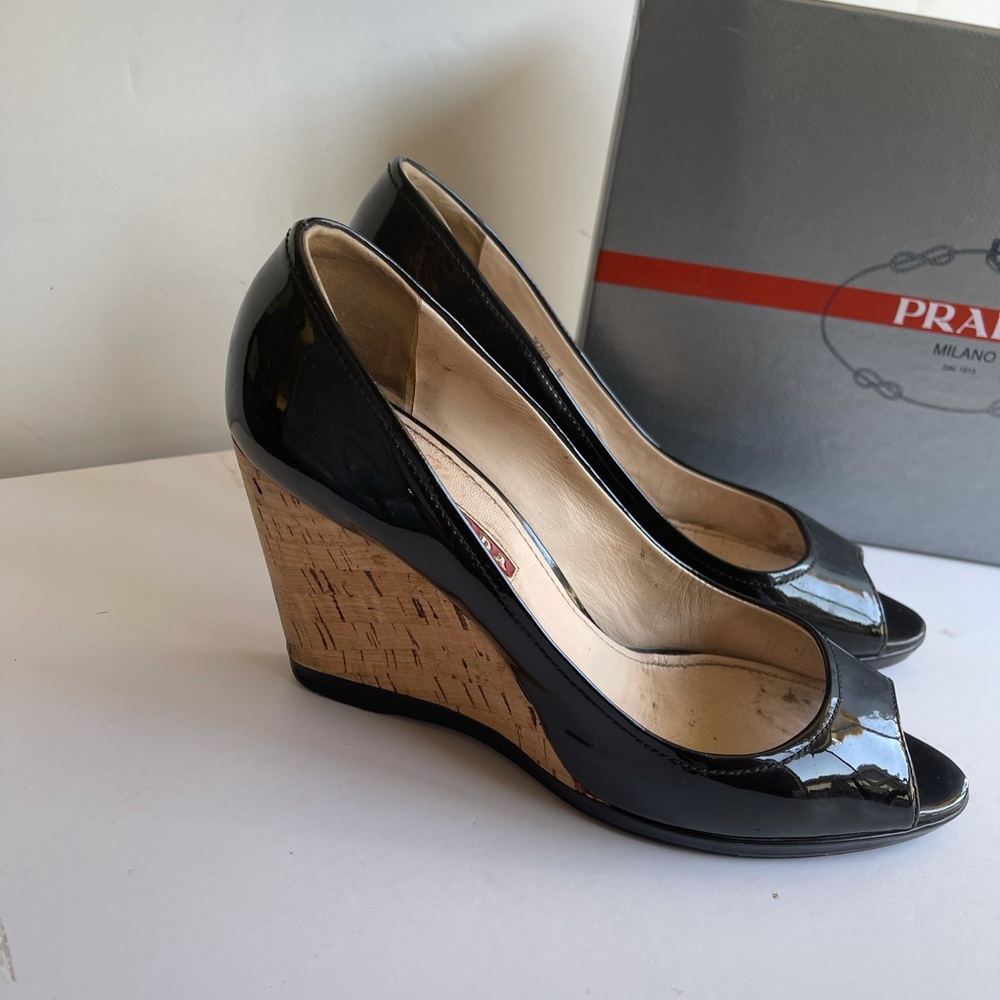 Black patent Prada wedges